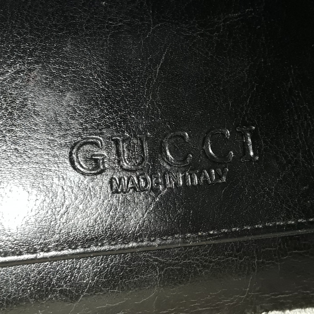 Gucci trifold wallet and checkbook holder